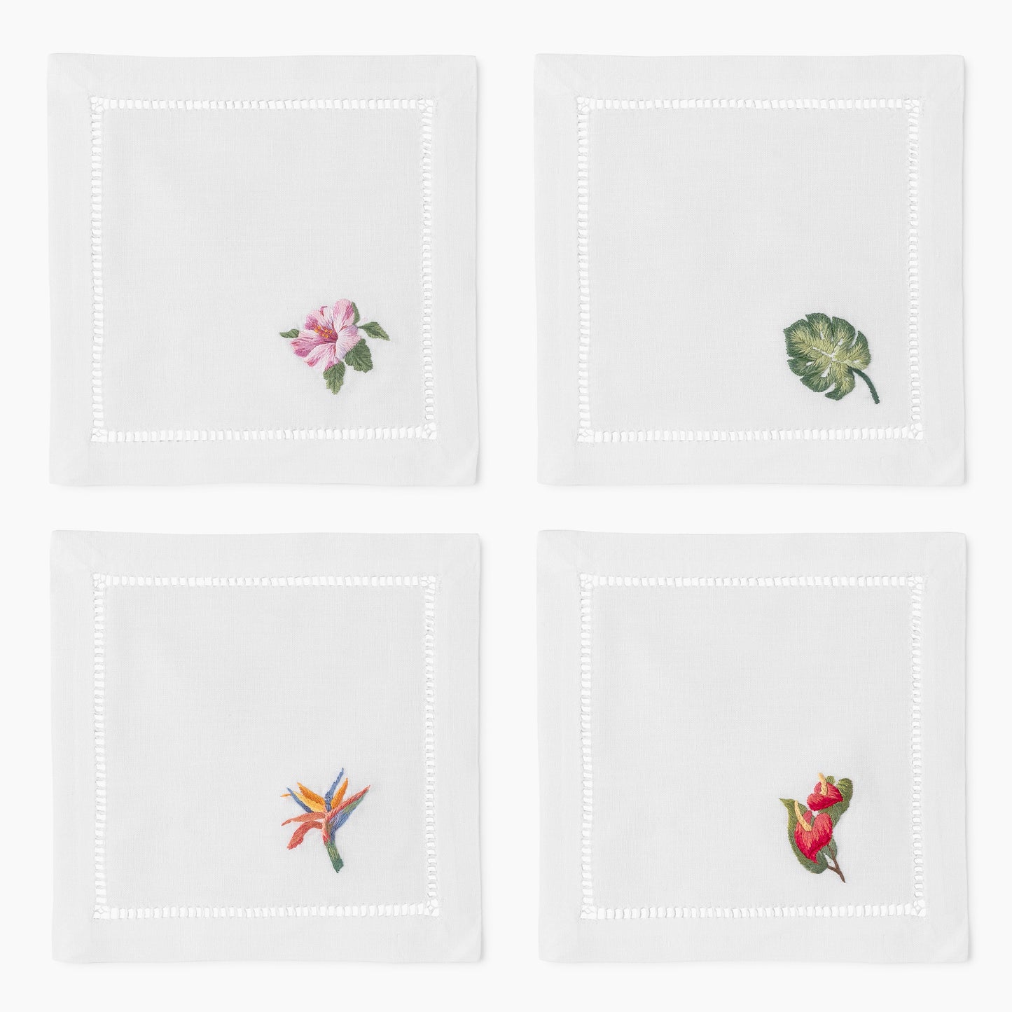 Four Tropical Mixed Cocktail Napkins with embroidered flowers and leaves by Henry Handwork.