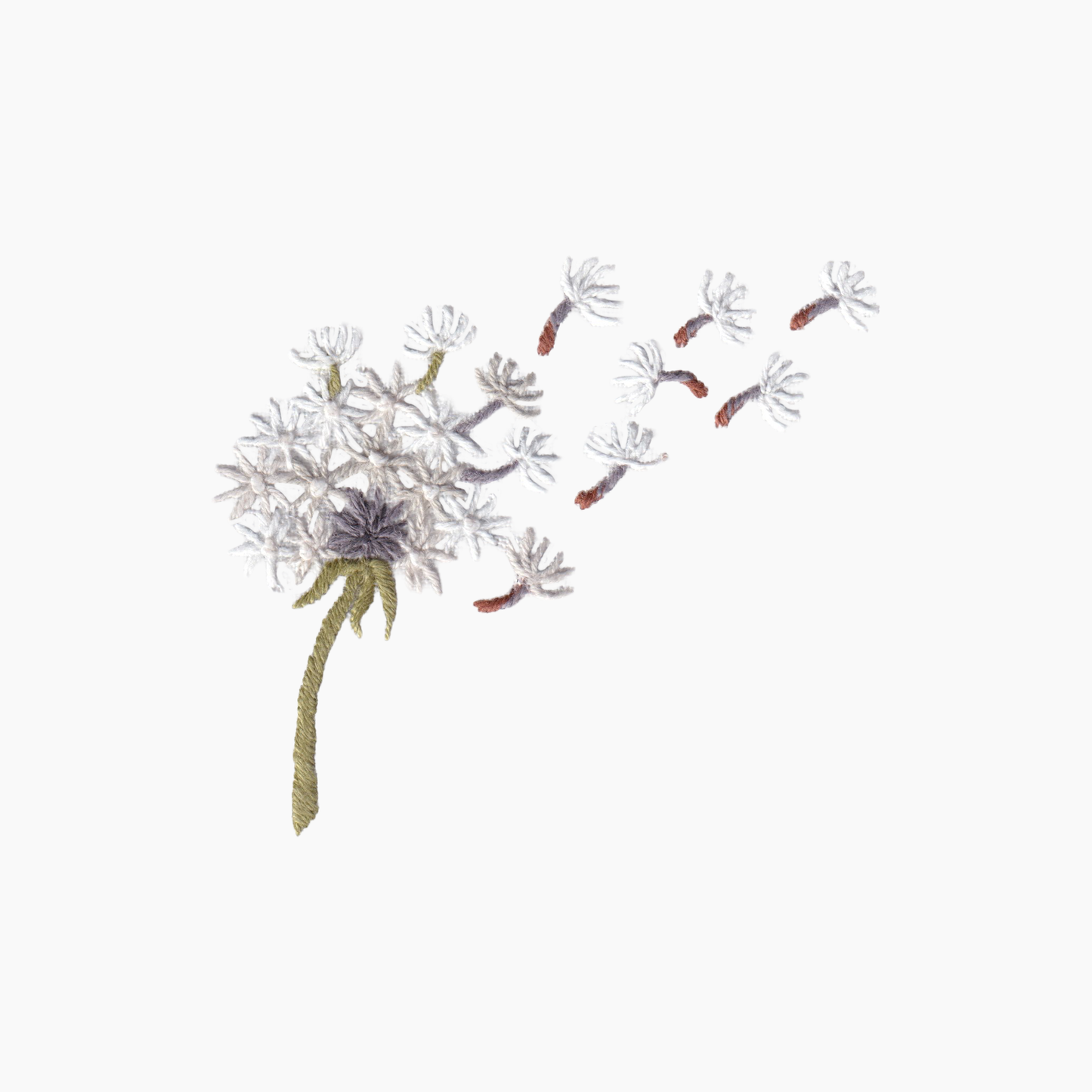 Hand embroidered cotton boutique tissue box cover of dandelion with seeds blowing away on a white background