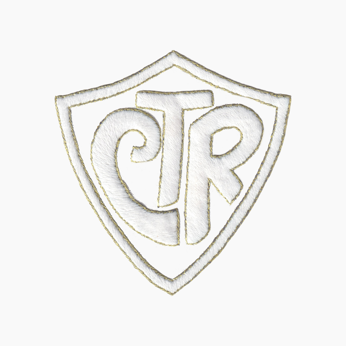 Hand embroidered cotton towel of logo with initials 'CTR' on a shield shape background