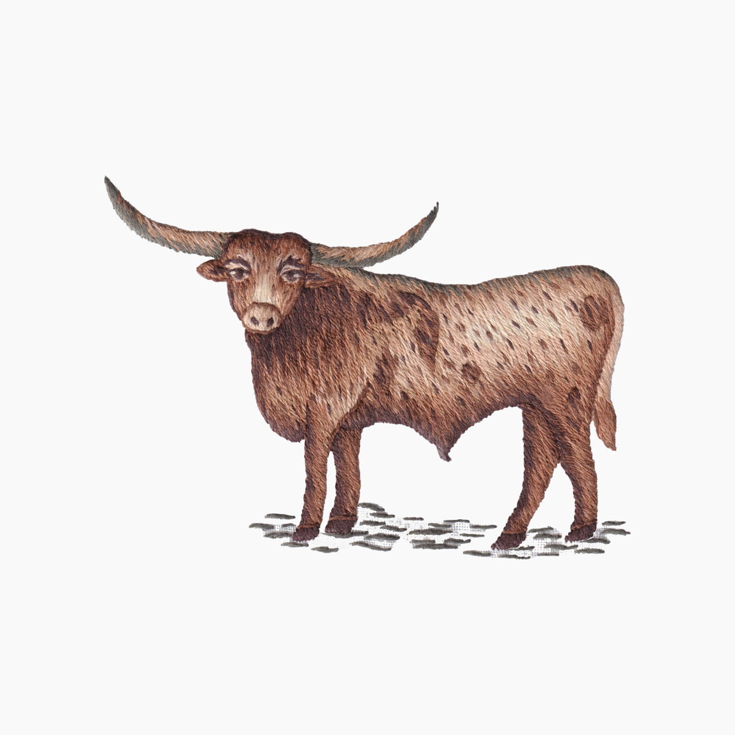 Hand embroidered cotton towel with of a Texas longhorn cow on a white background