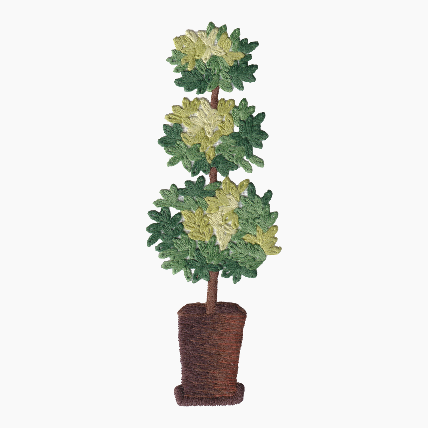 Hand embroidered cotton towel of decorative topiary plant with green and brown pot on a white background