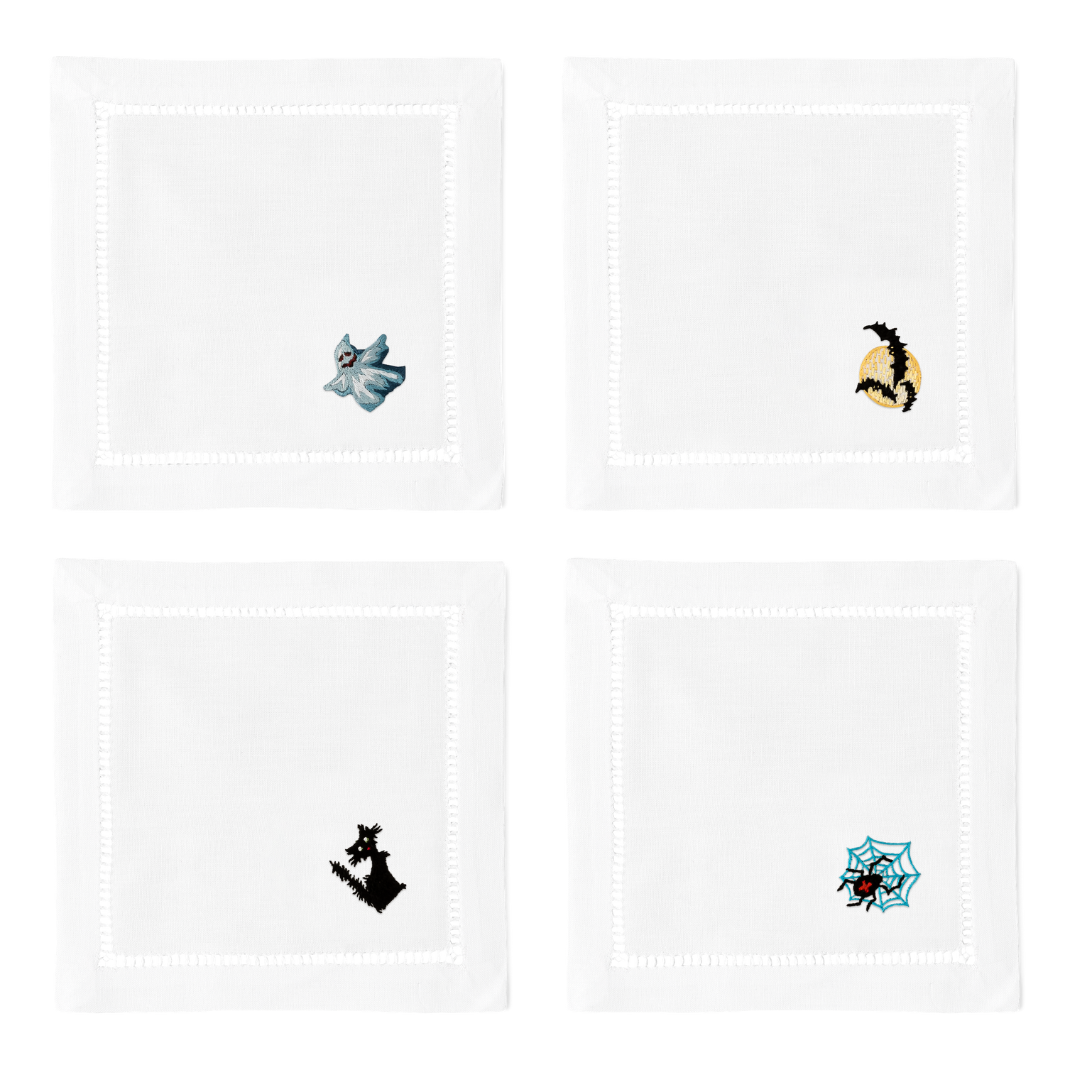 4 white cocktail napkins. Embroidered in the bottom right corner of each is a ghost, 3 bats, a black cat, and a spider.