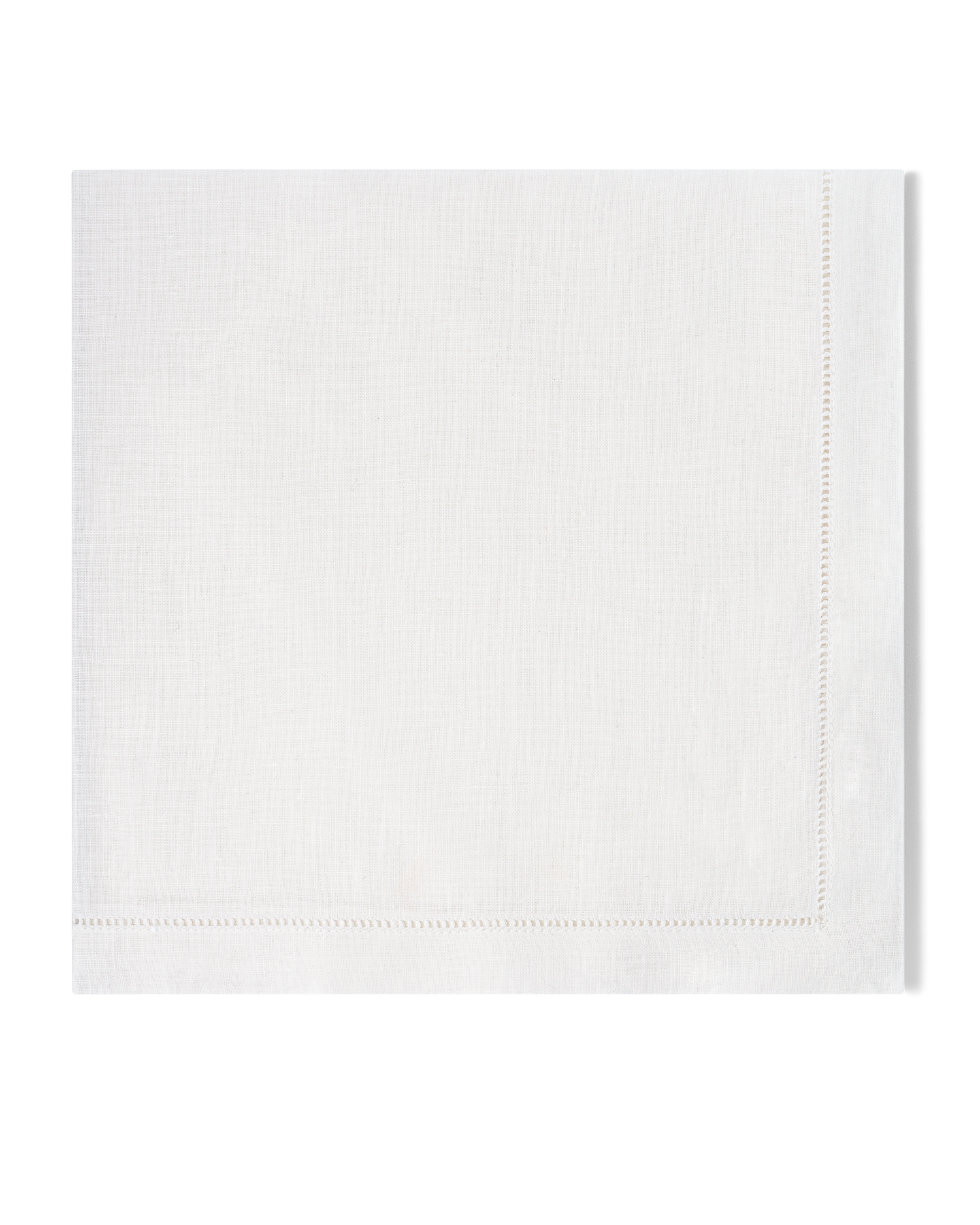 A white linen napkin with a hemstitch border