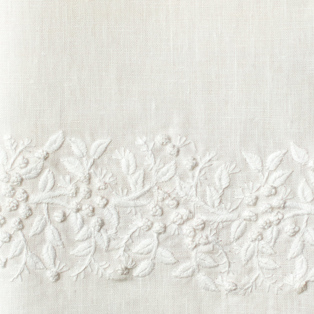 An example of white linen with white embroidery