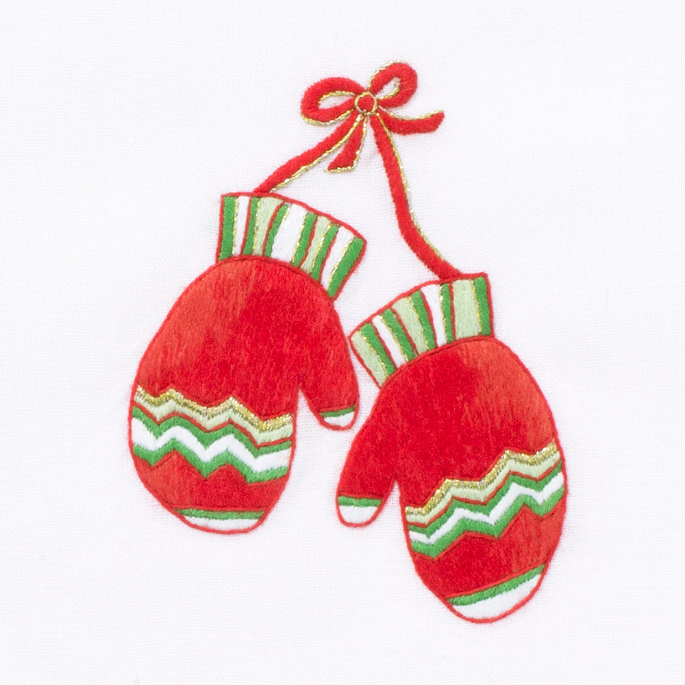 A detailed image of the embroidery - A pair of red mittens with green accents tied together in a red bow