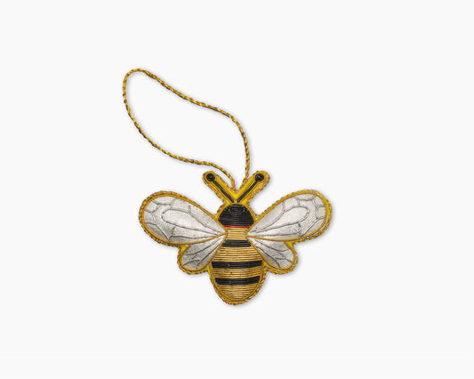 Image of a bumble bee Christmas ornament with intricate beadwork. 