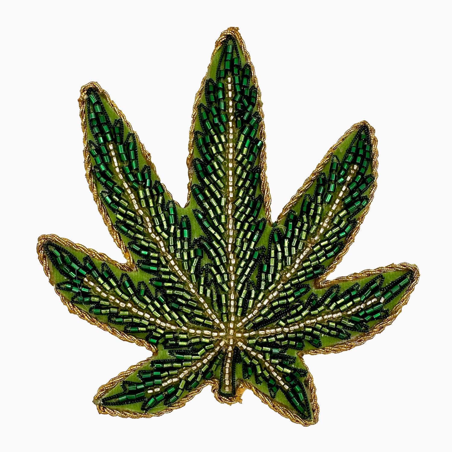 Image of a Cannabis leaf Christmas ornament with ornate beadwork.