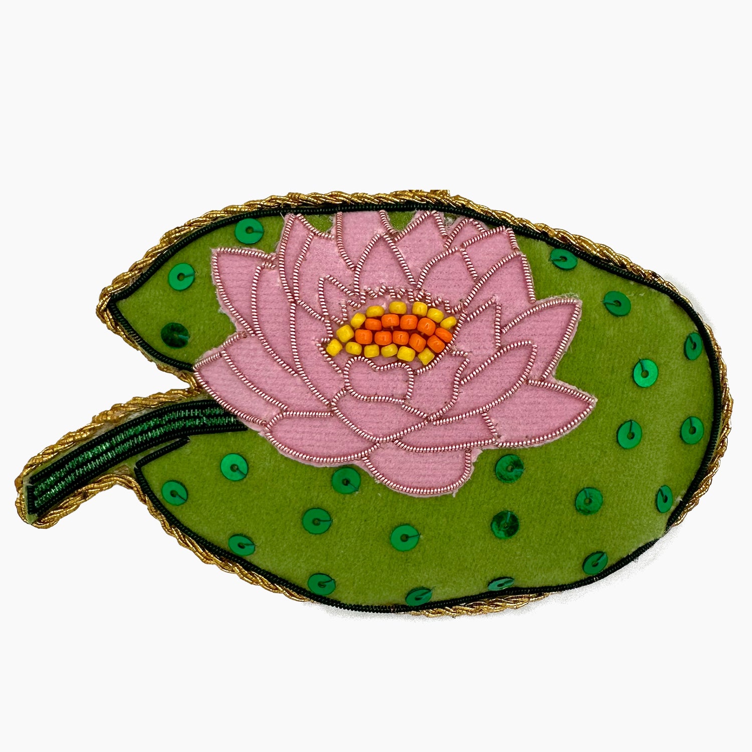 Image of a lotus flower Christmas ornament with intricate beadwork. 