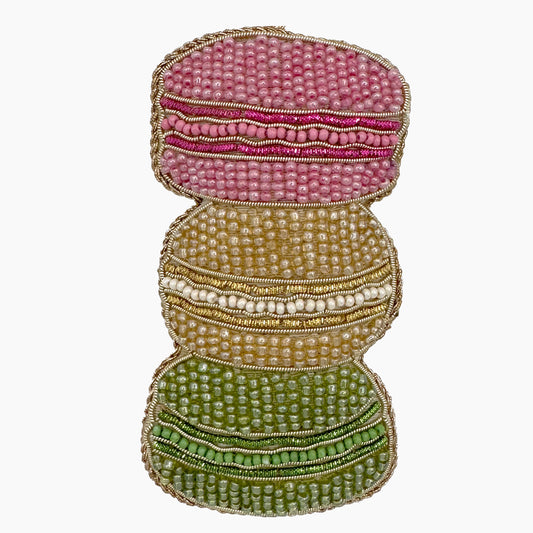 Image of a Macaron cookie Christmas ornament with intricate beadwork. 