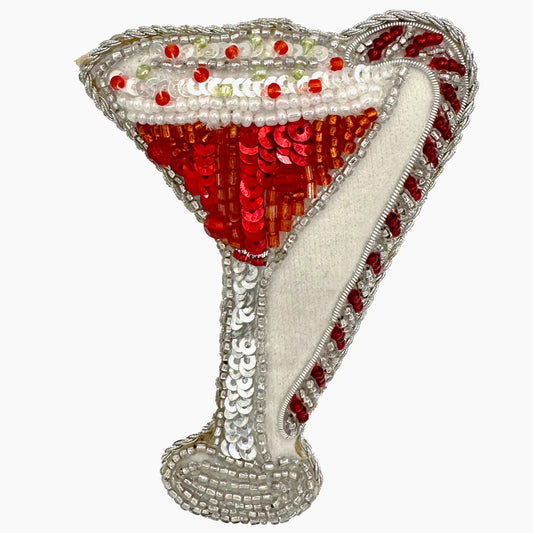 Image of a peppermint martini Christmas ornament with intricate beadwork.