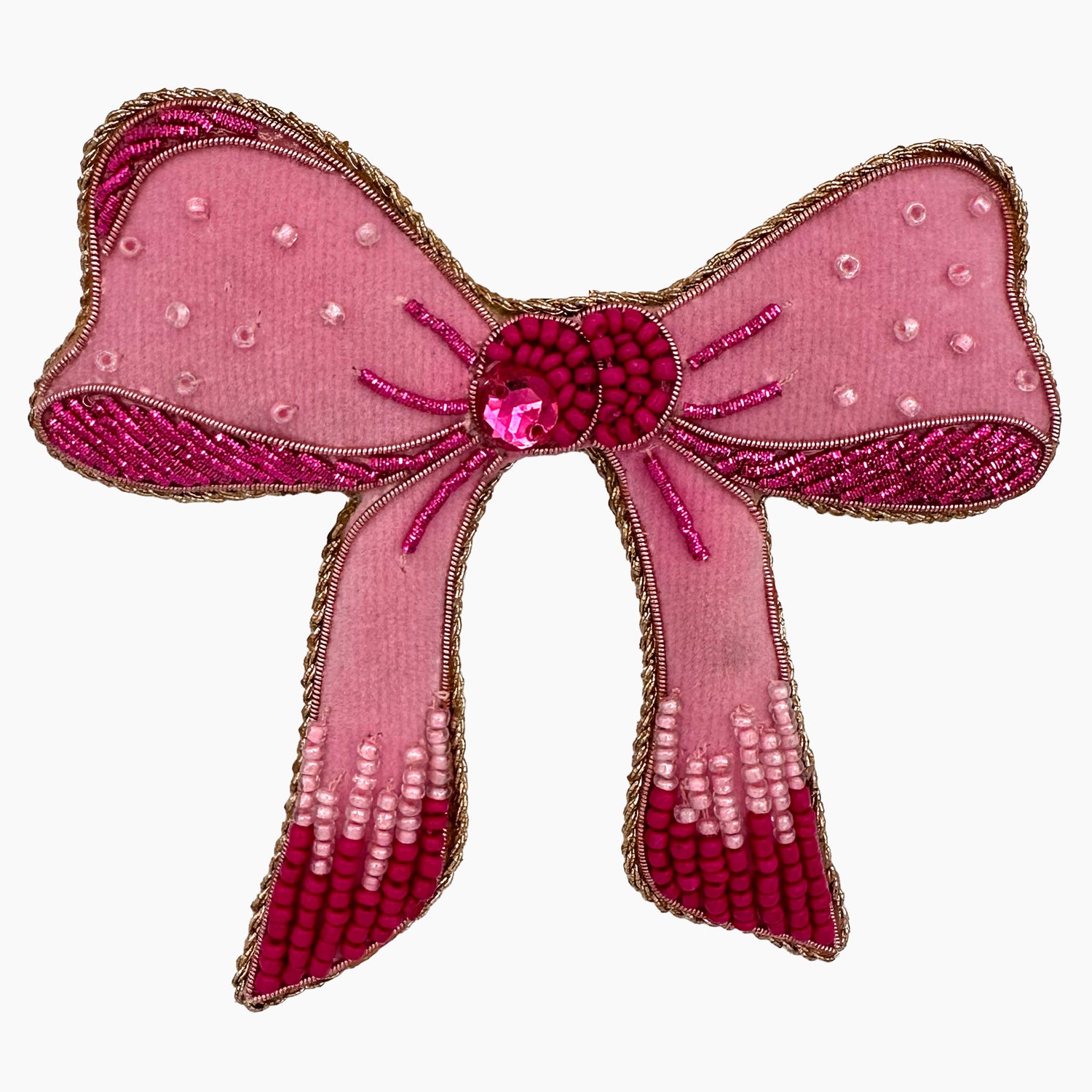 Image of a pink bow Christmas ornament with ornate beadwork.