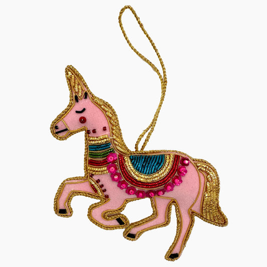 Image of a pink Unicorn Christmas ornament with intricate beadwork. 