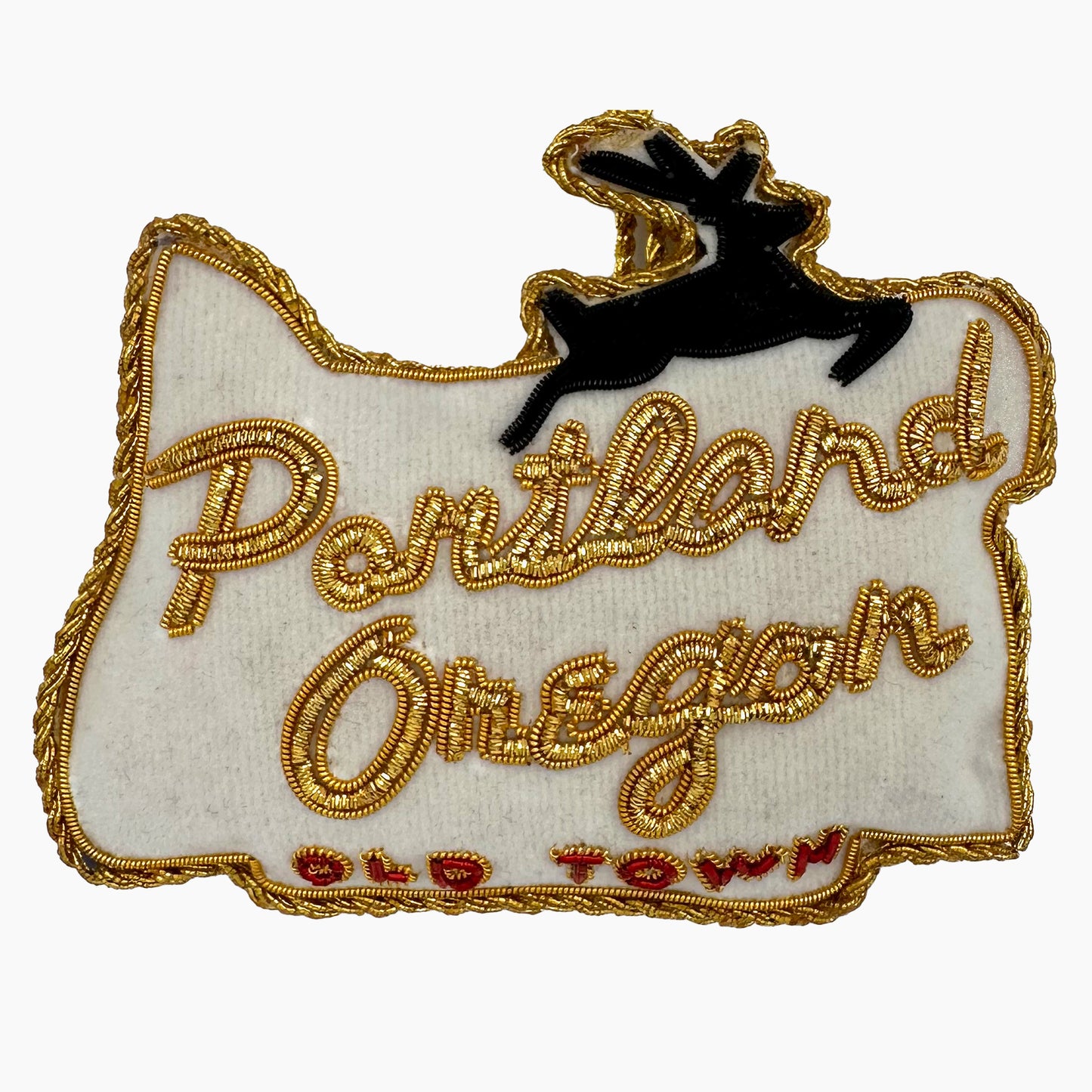 Image of a Portland Oregon Old Town sign Christmas ornament with ornate beadwork.