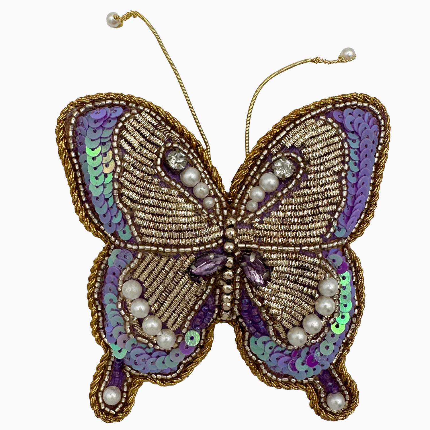 Image of a purple butterfly Christmas ornament with ornate beadwork.