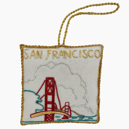 Image of the San Francisco Golden Gate Bridge Christmas ornament with intricate beadwork. 