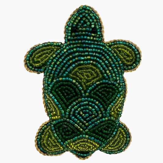 Image of a sea turtle Christmas ornament with intricate beadwork.