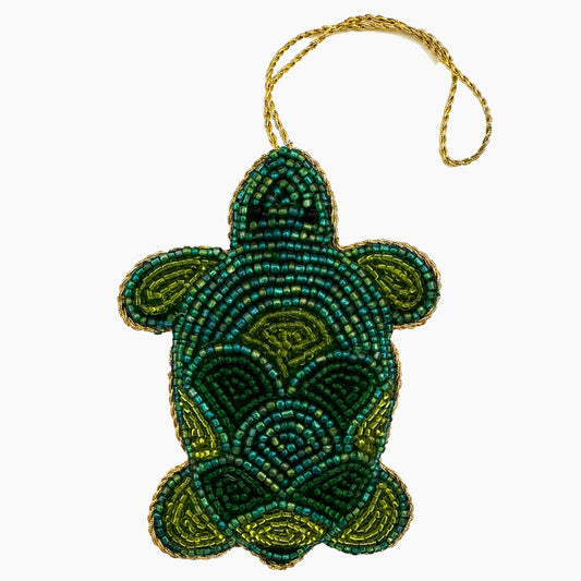 Image of a sea turtle Christmas ornament with intricate beadwork.