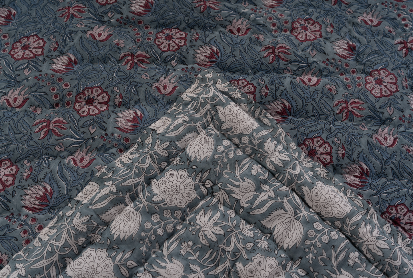 Floral patterned fabric with a focus on texture and design.