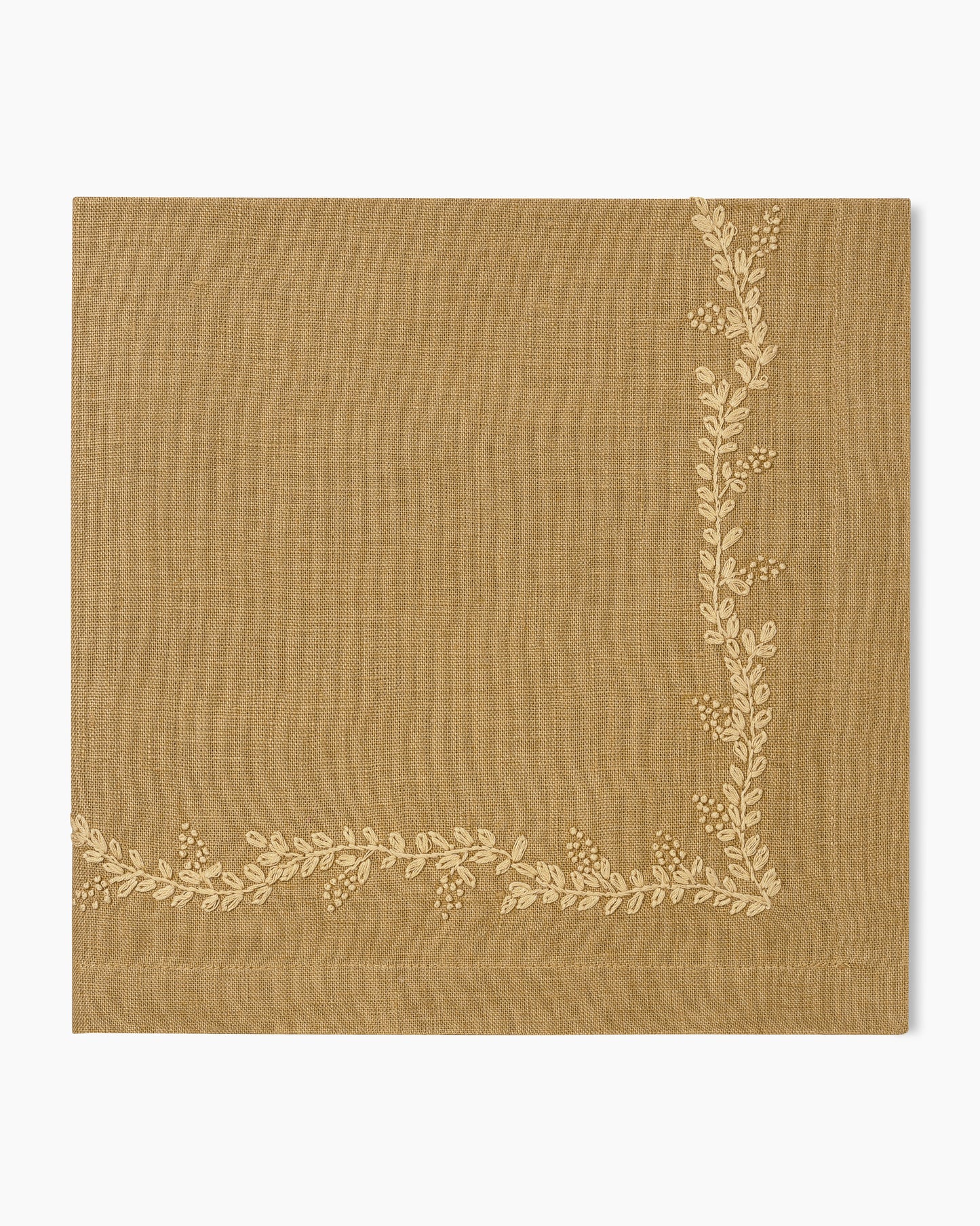 A Prism Vine Linen Dinner Napkin available in 13 Colors with a gold leaf design, perfect for your table linens.