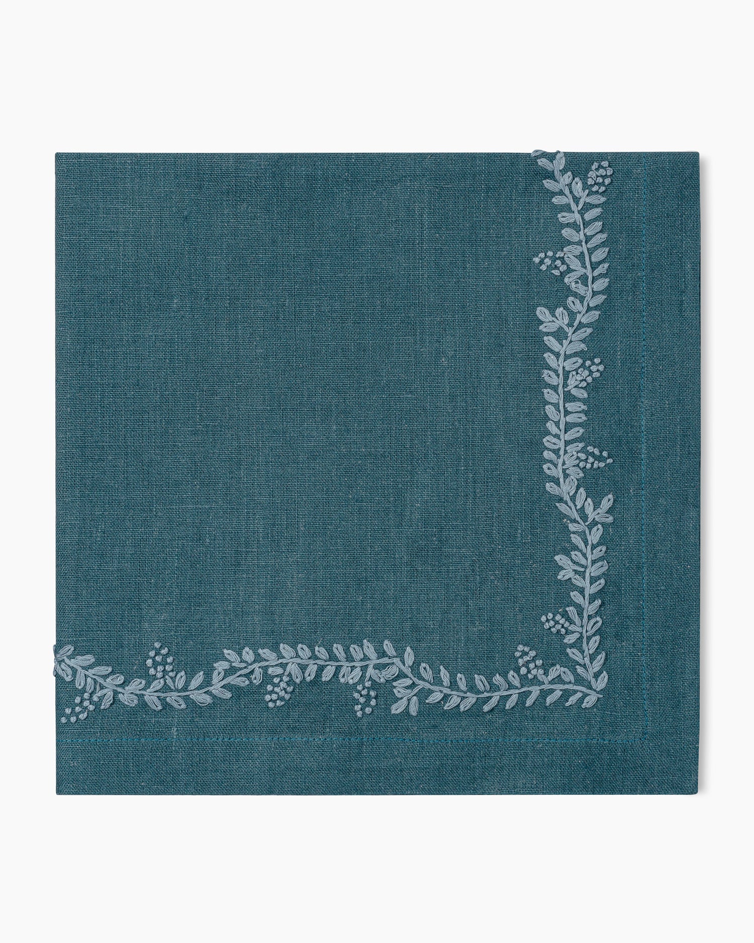 A Prism Vine Linen Dinner Napkin - 13 Colors with a floral pattern, perfect for enhancing your table linens collection.