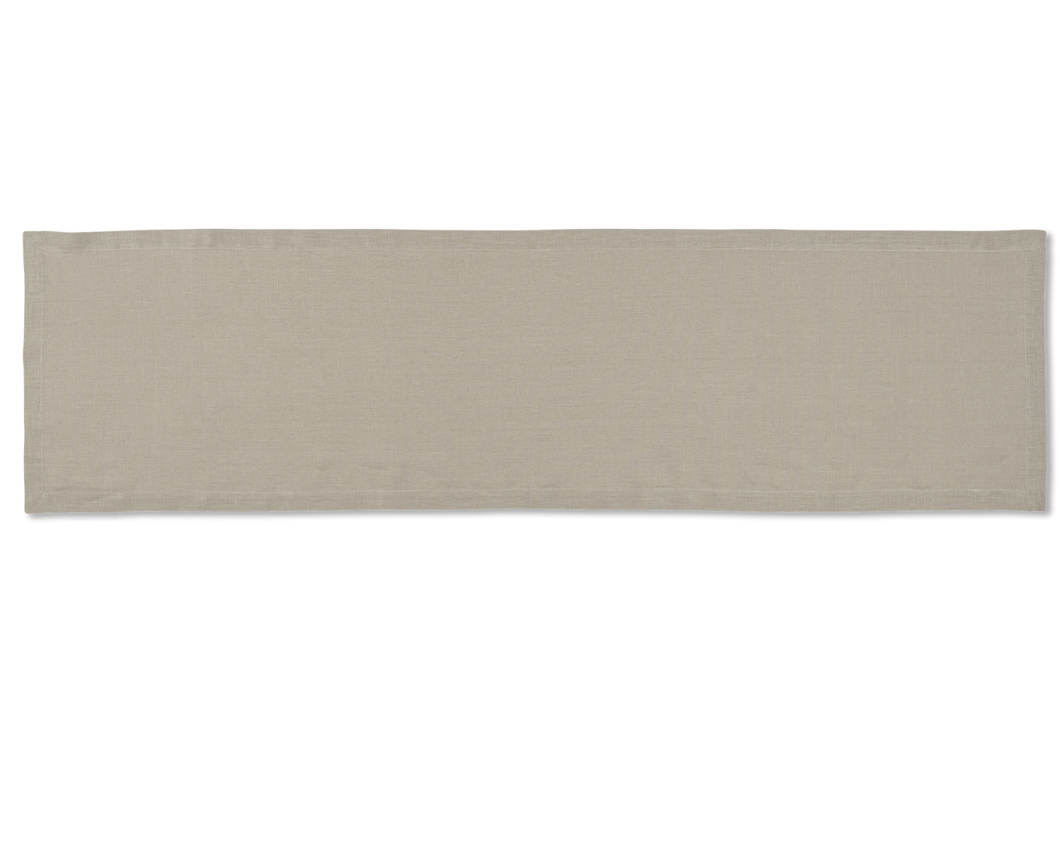 A linen table runner in the color sand