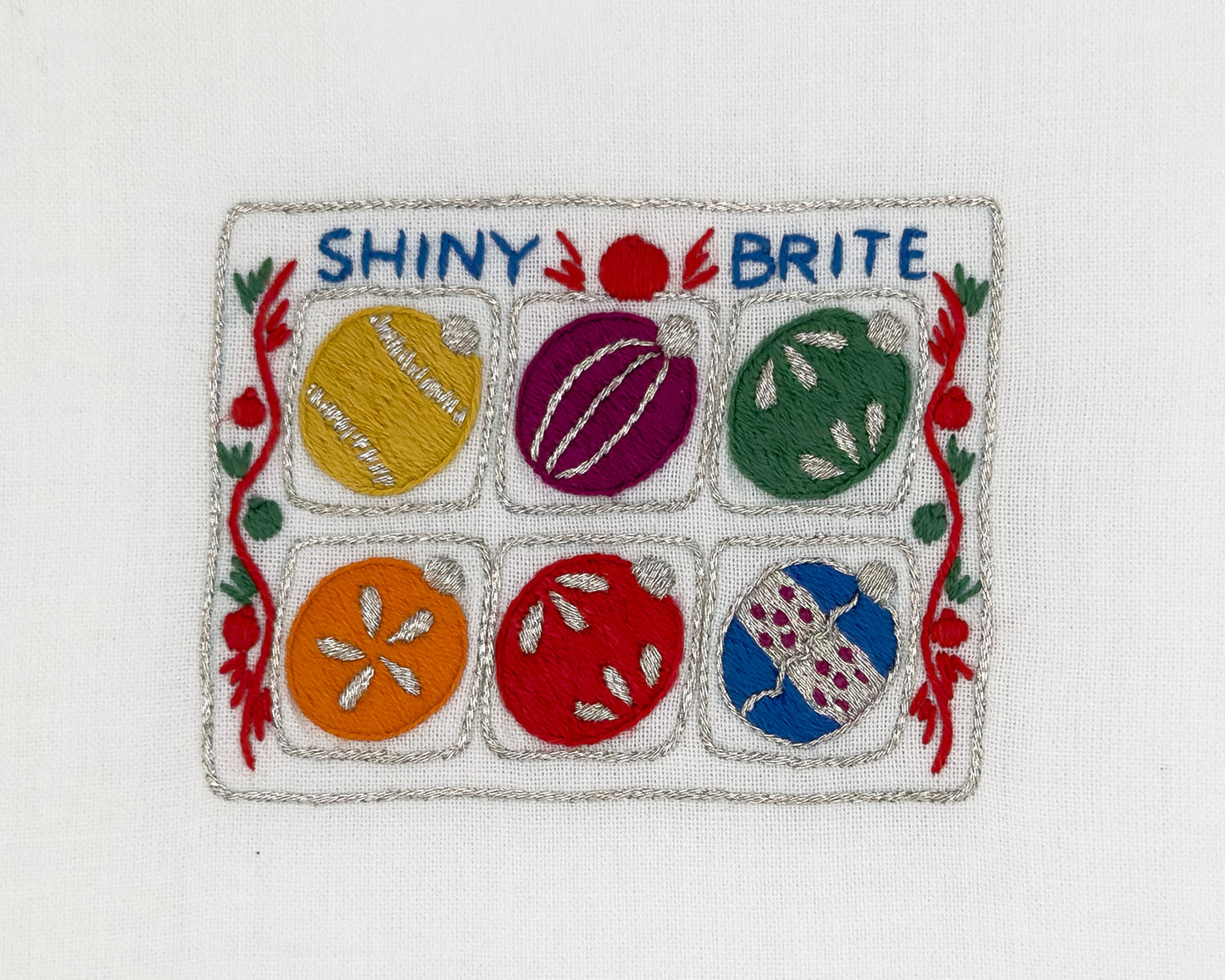 Image of a Henry Handwork Shiny Brite motif.