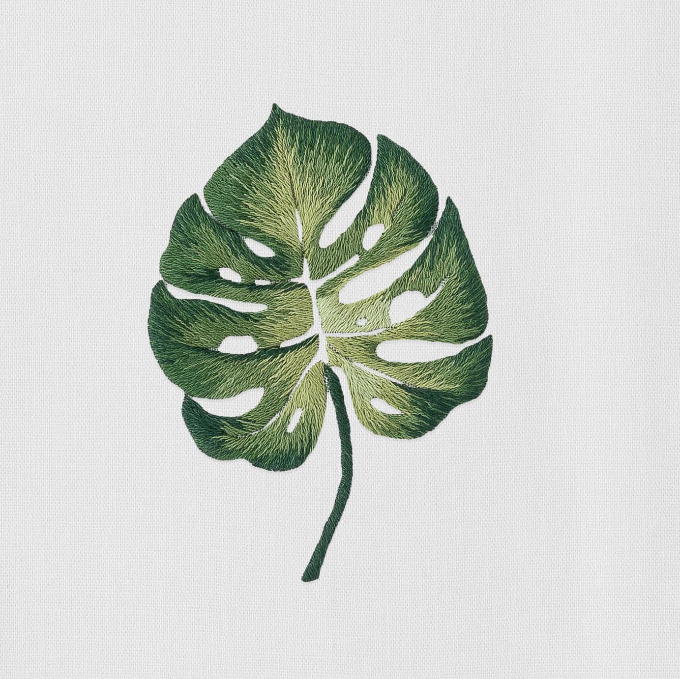 An illustration of a Tropical Leaf Napkin on a white background, made by Henry Handwork.