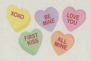 a group of candy hearts with text