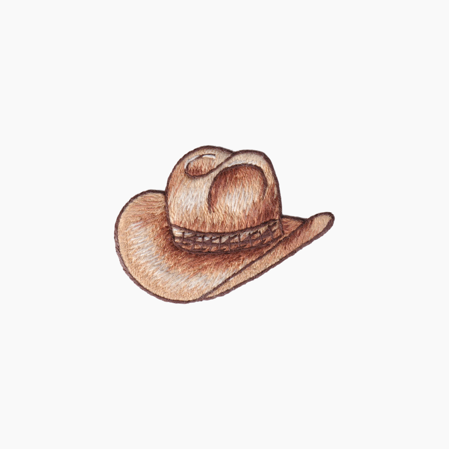Hand embroidered cotton boutique tissue box cover of brown cowboy hat on a white background