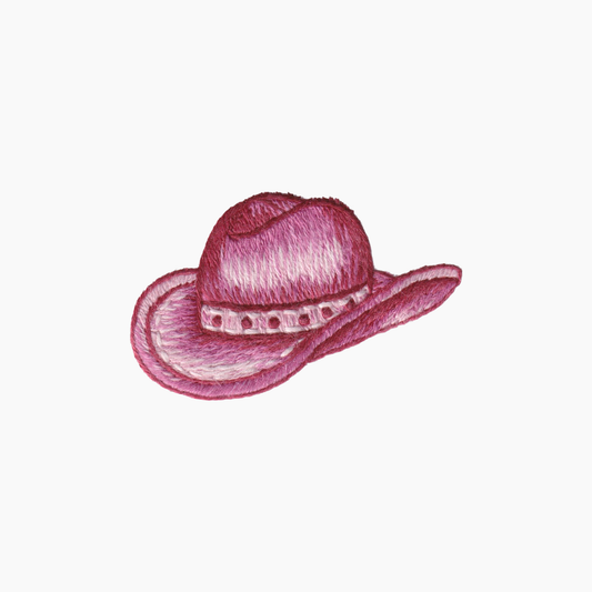 Hand embroidered cotton boutique tissue box cover of pink cowgirl hat with a band on a white background