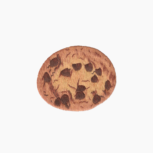 Hand embroidered cotton towel with chocolate chip cookie motif on a white background