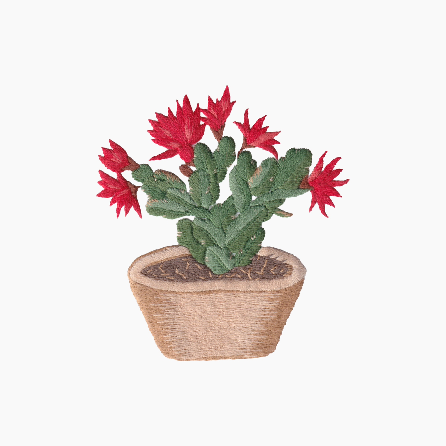 Hand embroidered cotton towel with potted Christmas cactus with red flowers on a white background