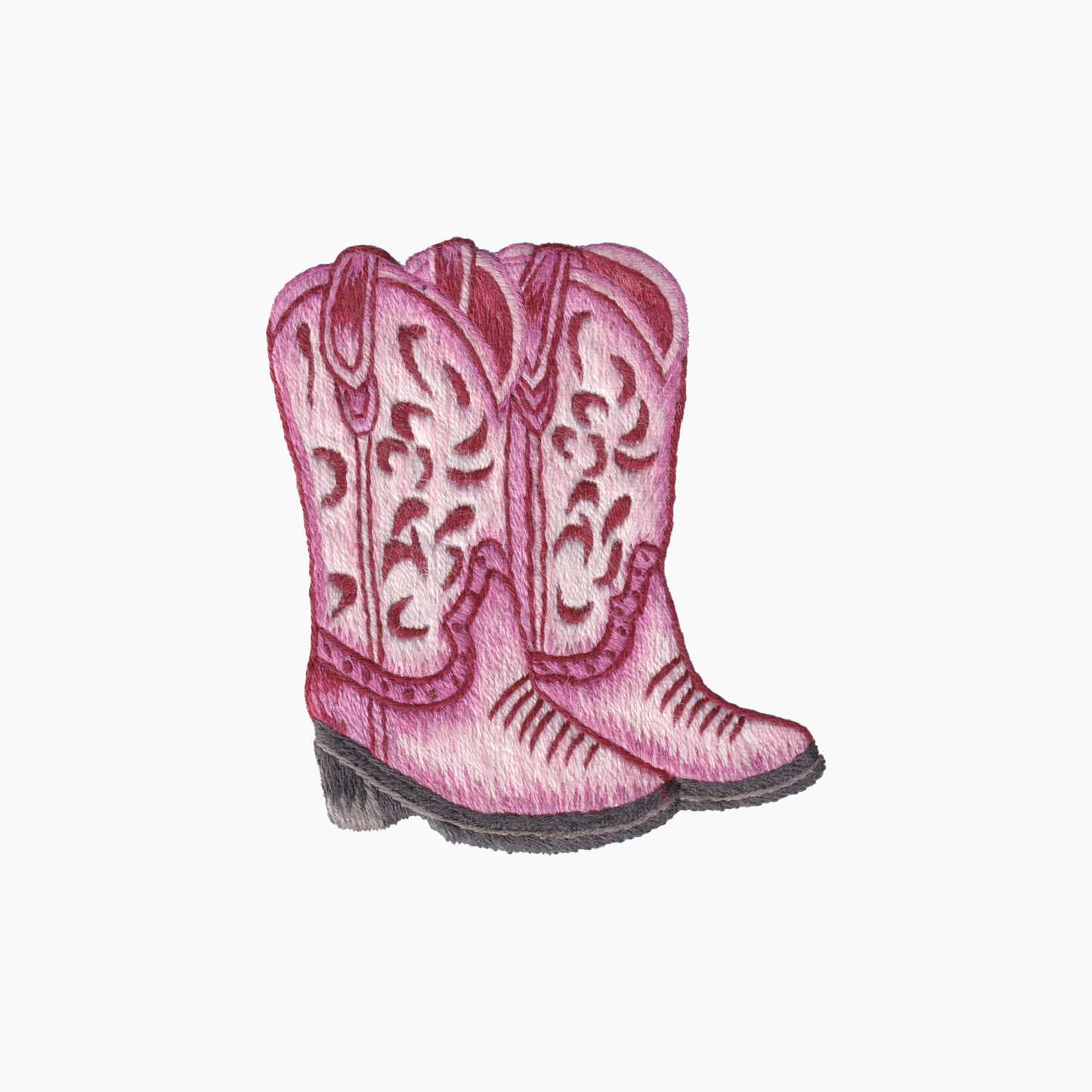 Hand embroidered cotton towel with pink cowgirl boots with intricate designs on a white background