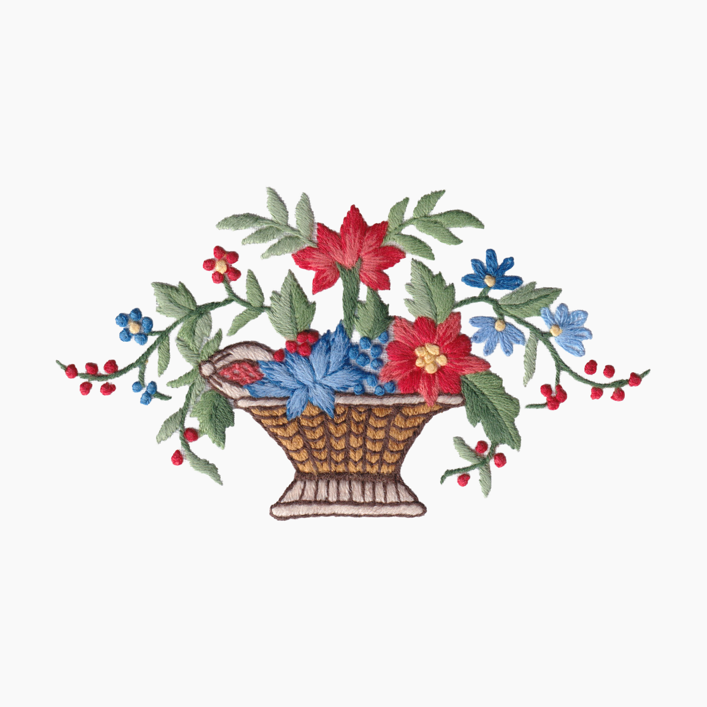 Hand embroidered cotton towel with traditional design of a basket with flowers on a white background