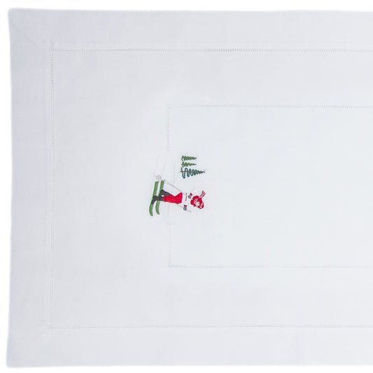 A skier in red embroidered on the runner