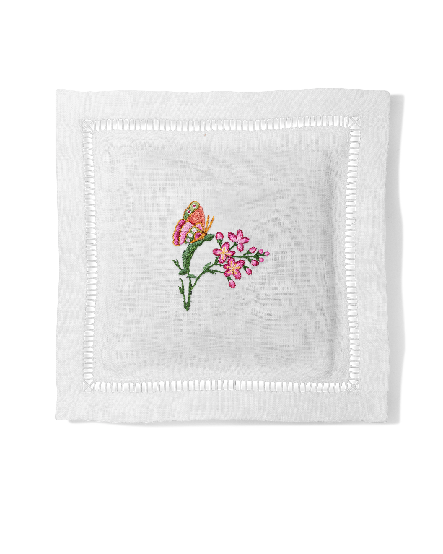 A white sachet with a hemstitch border. 1 butterfly on a pink flower with green leaves is embroidered in the center.