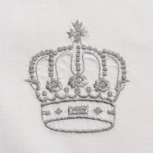 A close up detailed image of the embroidery - A silver crown.