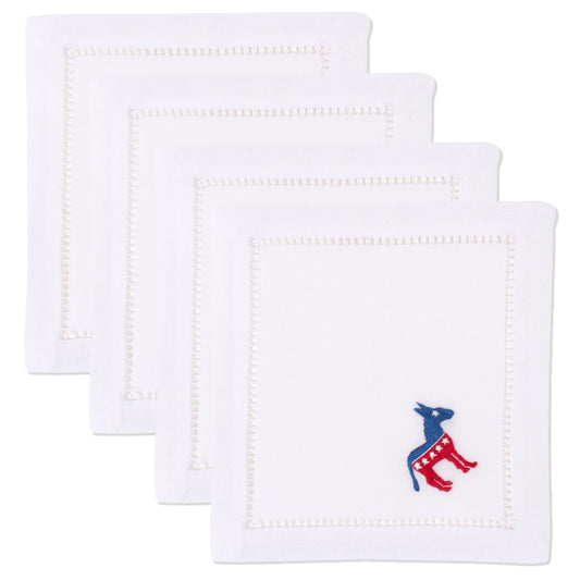 4 white cocktail napkins. Embroidered in the bottom right corner of each is a democrat donkey symbol in red white & blue.