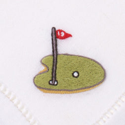 a putting green with a red #19 flag and a golf ball rolling towards the hole