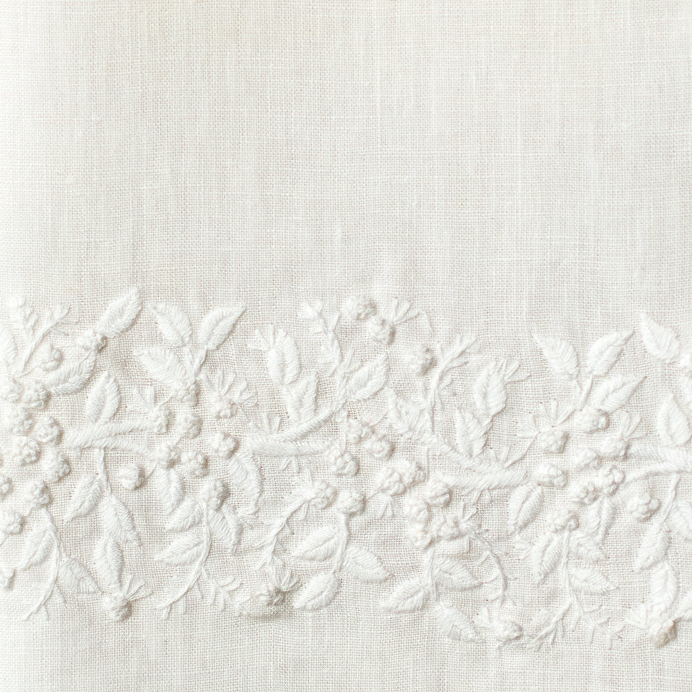 An example of white linen with white embroidery