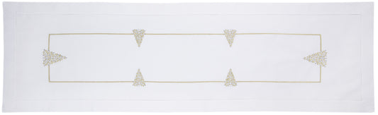A white table runner with a hemstitch border. Glittering gold and silver christmas trees run down the middle