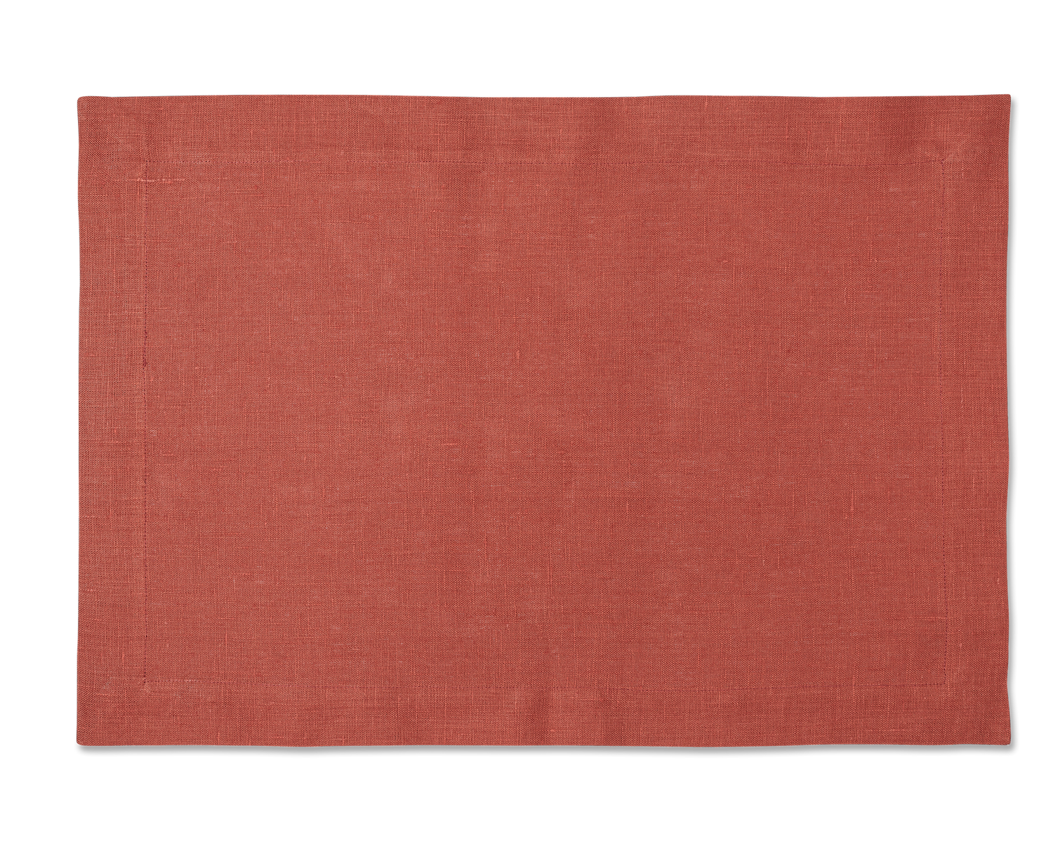 A linen placemat in the color brick