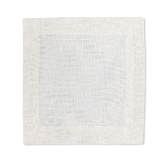 A square linen cocktail napkin in the color oyster