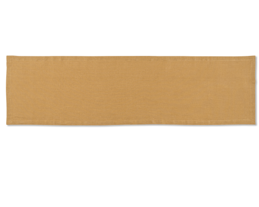 A linen table runner in the color curry
