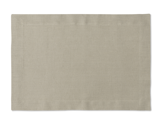 A linen placemat in the color sand