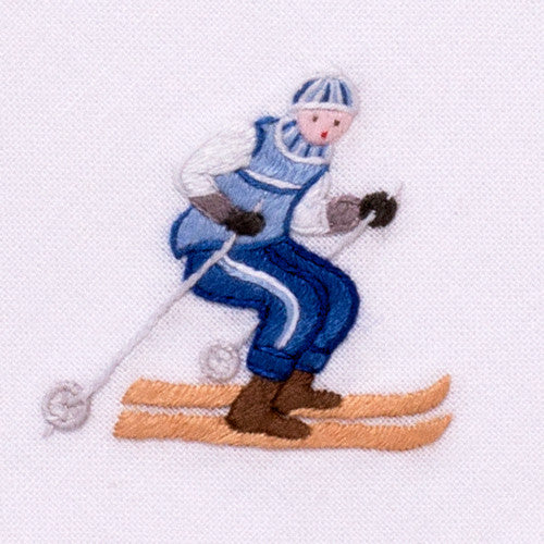 an embroidered male skier wearing blue