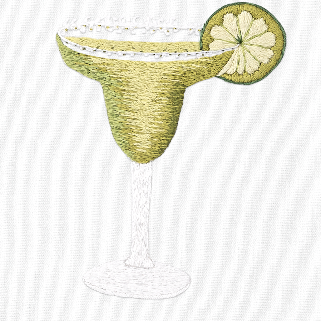 a margarita cocktail with a salted rim and lime slice
