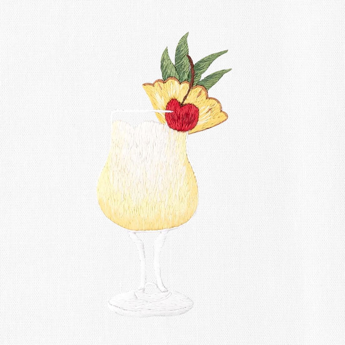 a pina colada cocktail with a pineapple slice and cherry