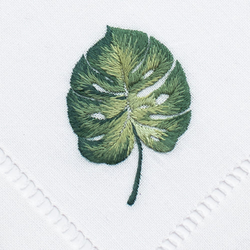 an embroidered green monstera leaf